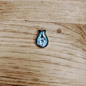 Silver tone and diamond look slide